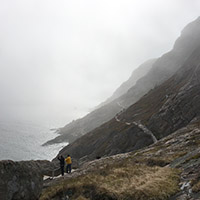 The wavering coastline on a foggy day.